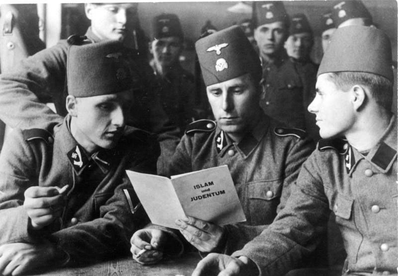 SS Muslim troops reading an antisemitic Islamic pamphlet